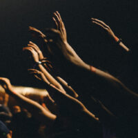 arms up in a concert crowd